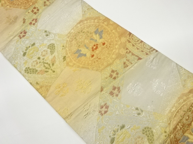 ふくれ織切り嵌め風に草花・向かい鳥模様織出し袋帯